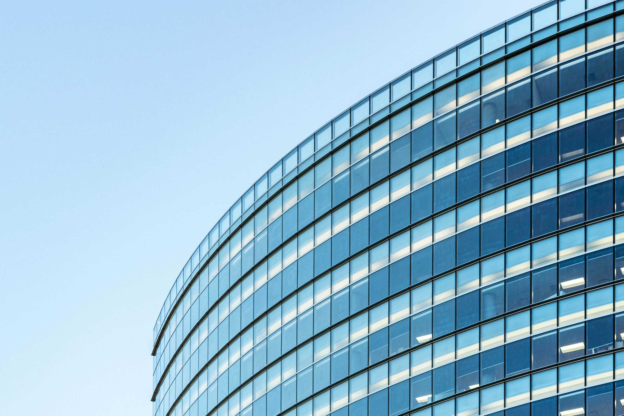 Modern white and blue glass commercial building facade