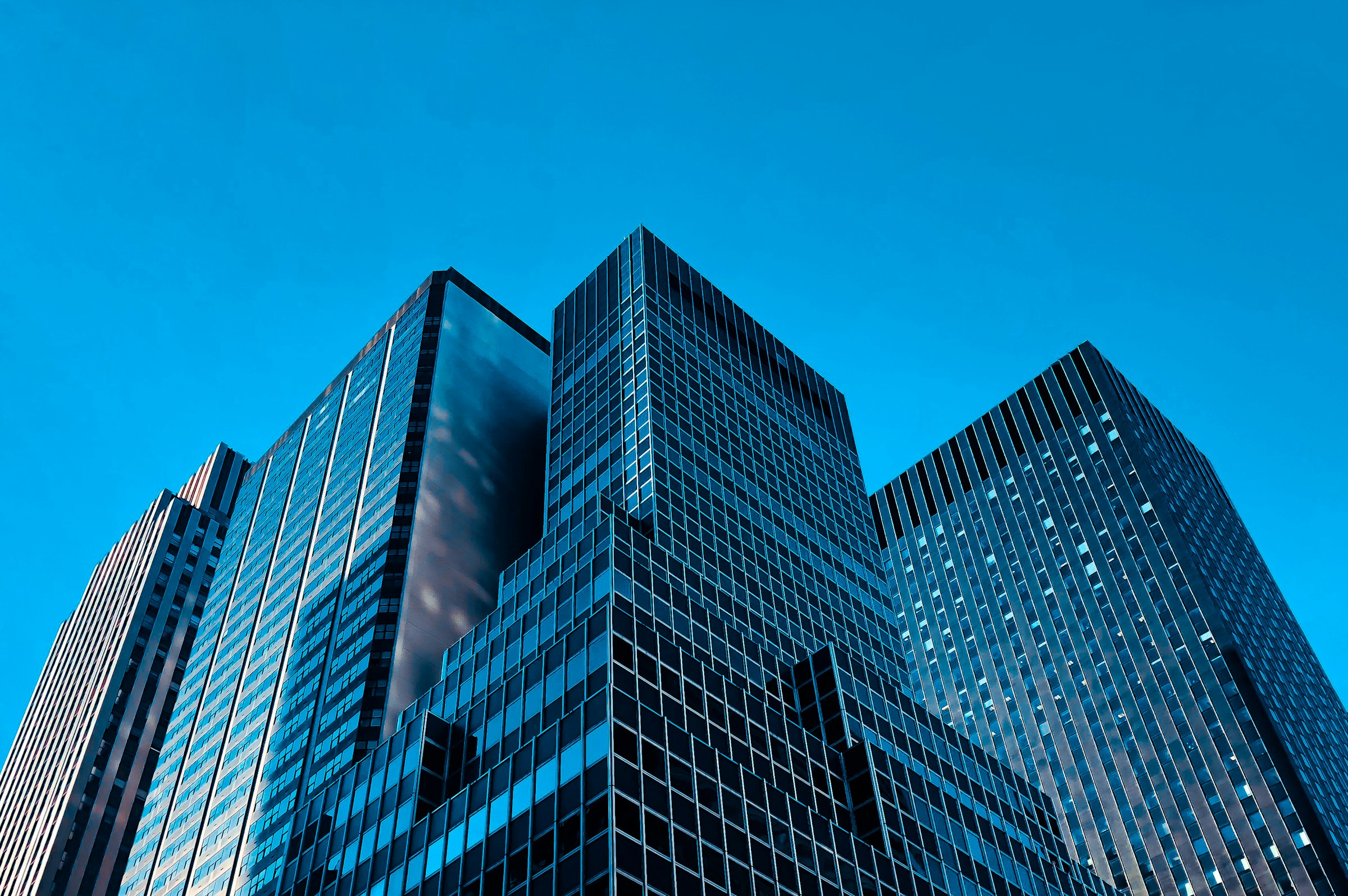 Modern commercial high-rise reaching into a clear sky